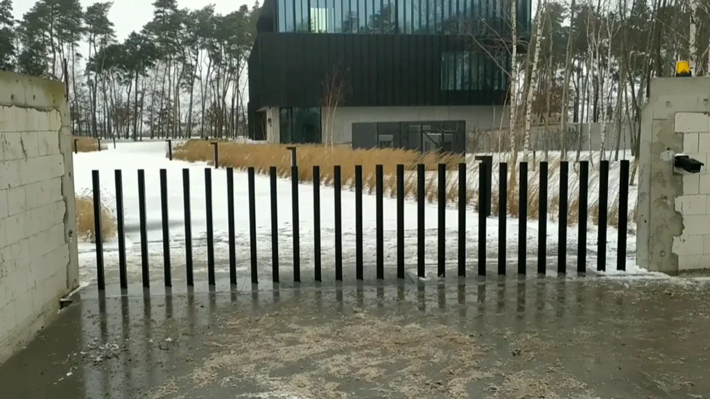 retractable gate into the ground